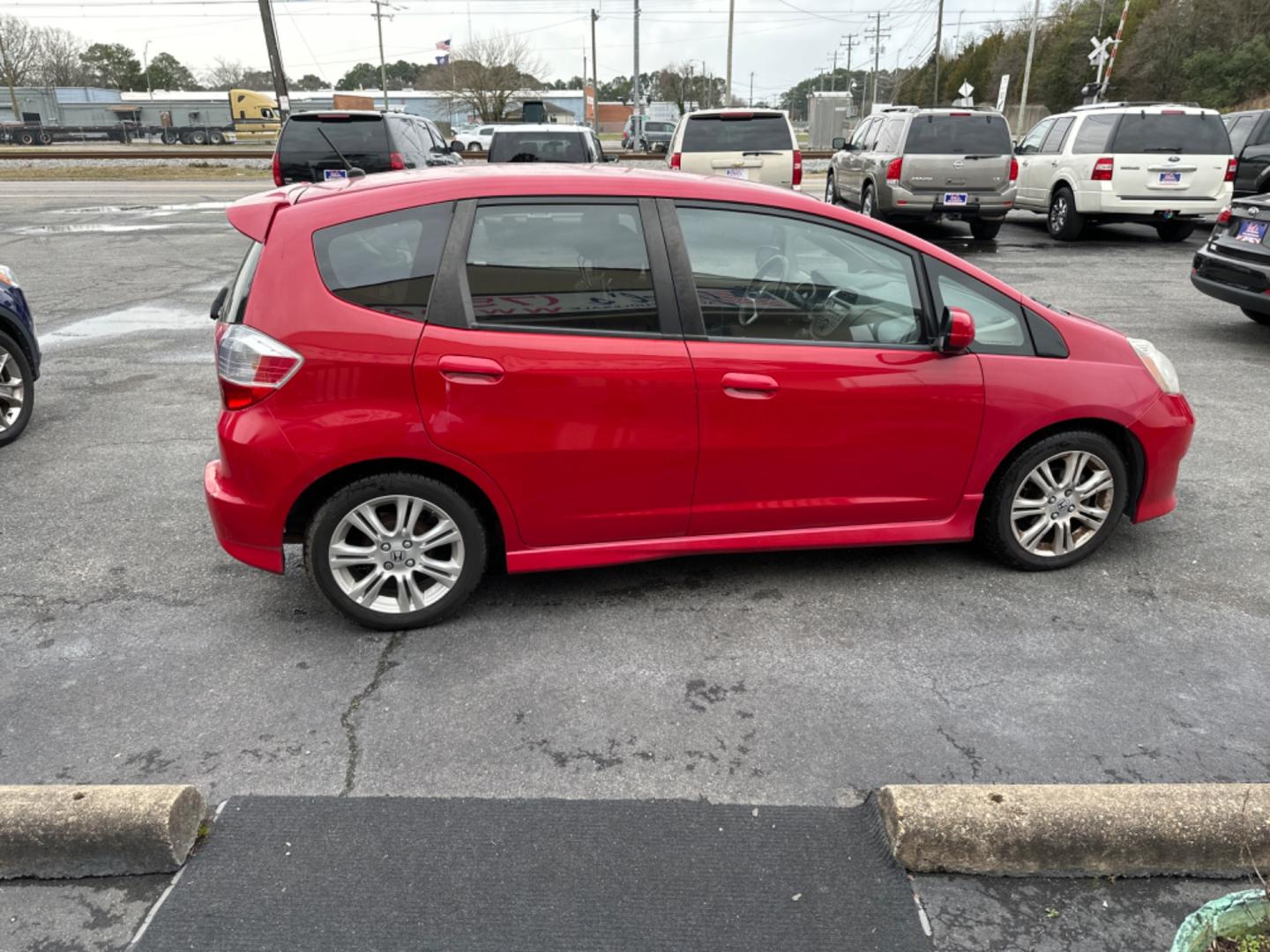 2009 Red Honda Fit (JHMGE88419S) , located at 5700 Curlew Drive, Norfolk, VA, 23502, (757) 455-6330, 36.841885, -76.209412 - Photo#5